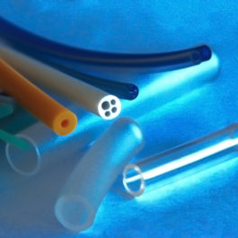 A group of different types of plastic tubes.